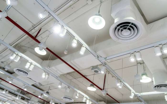 bare ceiling with air duct cctv air conditioner pipe and fire system picture id1195765543 1