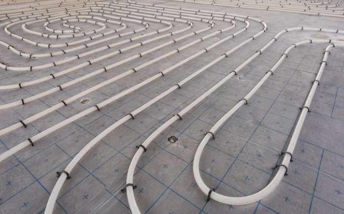 underfloor heating system installation close up on water floor of picture id1168782168 1